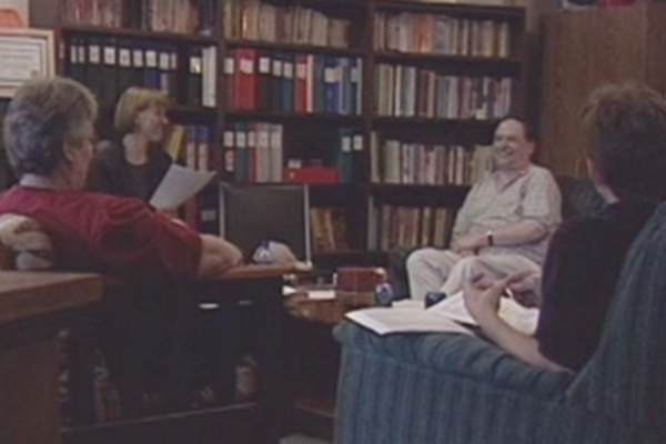 Group of people sitting in a room