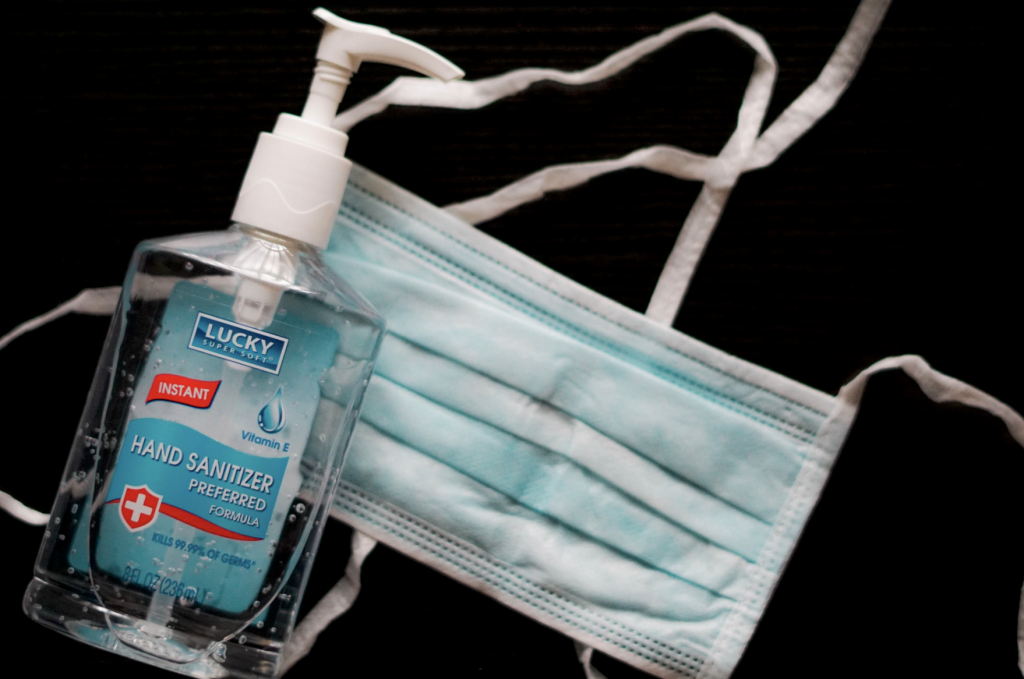 hand sanitizer and mask