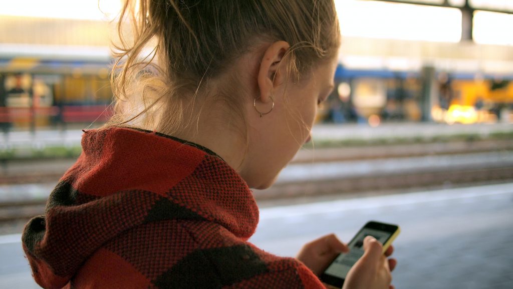 Woman looking at her mobile phone